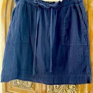 Dark blue skirt.